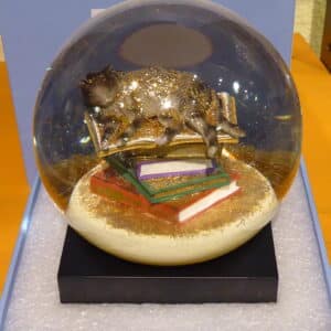 CoolSnowGlobe Cat on Books